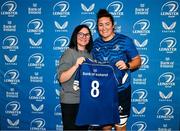 25 August 2023; Hannah O'Connor is presented with her jersey by former Leinster and Ireland rugby player Yvonne Nolan during a Leinster Rugby Women's jersey presentation at Old Belvedere RFC in Dublin. Photo by Piaras Ó Mídheach/Sportsfile