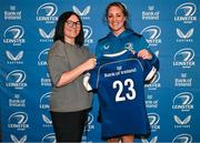 25 August 2023; Elise O'Byrne-White is presented with her jersey by former Leinster and Ireland rugby player Yvonne Nolan during a Leinster Rugby Women's jersey presentation at Old Belvedere RFC in Dublin. Photo by Piaras Ó Mídheach/Sportsfile