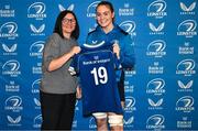 25 August 2023; Katelynn Doran is presented with her jersey by former Leinster and Ireland rugby player Yvonne Nolan during a Leinster Rugby Women's jersey presentation at Old Belvedere RFC in Dublin. Photo by Piaras Ó Mídheach/Sportsfile