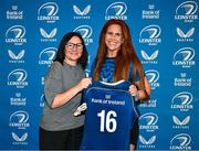 25 August 2023; Caoimhe Molloy is presented with her jersey by former Leinster and Ireland rugby player Yvonne Nolan during a Leinster Rugby Women's jersey presentation at Old Belvedere RFC in Dublin. Photo by Piaras Ó Mídheach/Sportsfile
