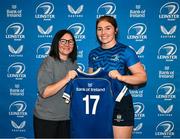 25 August 2023; Aoife Moore is presented with her jersey by former Leinster and Ireland rugby player Yvonne Nolan during a Leinster Rugby Women's jersey presentation at Old Belvedere RFC in Dublin. Photo by Piaras Ó Mídheach/Sportsfile