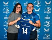 25 August 2023; Aimee Clarke is presented with her jersey by former Leinster and Ireland rugby player Yvonne Nolan during a Leinster Rugby Women's jersey presentation at Old Belvedere RFC in Dublin. Photo by Piaras Ó Mídheach/Sportsfile