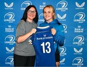 25 August 2023; Aoife Dalton is presented with her jersey by former Leinster and Ireland rugby player Yvonne Nolan during a Leinster Rugby Women's jersey presentation at Old Belvedere RFC in Dublin. Photo by Piaras Ó Mídheach/Sportsfile
