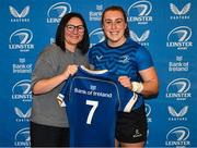 25 August 2023; Molly Boyne is presented with her jersey by former Leinster and Ireland rugby player Yvonne Nolan during a Leinster Rugby Women's jersey presentation at Old Belvedere RFC in Dublin. Photo by Piaras Ó Mídheach/Sportsfile