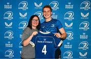 25 August 2023; Ruth Campbell is presented with her jersey by former Leinster and Ireland rugby player Yvonne Nolan during a Leinster Rugby Women's jersey presentation at Old Belvedere RFC in Dublin. Photo by Piaras Ó Mídheach/Sportsfile