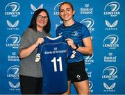 25 August 2023; Anna Doyle is presented with her jersey by former Leinster and Ireland rugby player Yvonne Nolan during a Leinster Rugby Women's jersey presentation at Old Belvedere RFC in Dublin. Photo by Piaras Ó Mídheach/Sportsfile