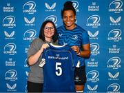 25 August 2023; Eimear Corri is presented with her jersey by former Leinster and Ireland rugby player Yvonne Nolan during a Leinster Rugby Women's jersey presentation at Old Belvedere RFC in Dublin. Photo by Piaras Ó Mídheach/Sportsfile