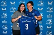 25 August 2023; Christy Haney is presented with her jersey by former Leinster and Ireland rugby player Yvonne Nolan during a Leinster Rugby Women's jersey presentation at Old Belvedere RFC in Dublin. Photo by Piaras Ó Mídheach/Sportsfile