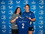 25 August 2023; Lisa Callan is presented with her jersey by former Leinster and Ireland rugby player Yvonne Nolan during a Leinster Rugby Women's jersey presentation at Old Belvedere RFC in Dublin. Photo by Piaras Ó Mídheach/Sportsfile