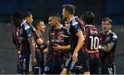 25 August 2023; Bohemians players celebrate after James Clarke, hidden, scored their side's first goal scored during the SSE Airtricity Men's Premier Division match between Bohemians and Derry City at Dalymount Park in Dublin. Photo by Stephen Marken/Sportsfile