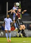 25 August 2023; James Clarke of Bohemians in action against Adam O'Reilly of Derry City during the SSE Airtricity Men's Premier Division match between Bohemians and Derry City at Dalymount Park in Dublin. Photo by Stephen McCarthy/Sportsfile