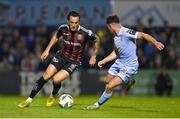 25 August 2023; Dylan Connolly of Bohemians in action against Brandon Kavanagh of Derry City during the SSE Airtricity Men's Premier Division match between Bohemians and Derry City at Dalymount Park in Dublin. Photo by Stephen Marken/Sportsfile