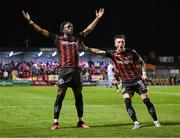 25 August 2023; Jonathan Afolabi of Bohemians celebrates after scoring his side's second goal with team-mate Danny Grant, right, during the SSE Airtricity Men's Premier Division match between Bohemians and Derry City at Dalymount Park in Dublin. Photo by Stephen McCarthy/Sportsfile