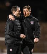 25 August 2023; Bohemians manager Declan Devine, right, and Derry City manager Ruaidhrí Higgins after the SSE Airtricity Men's Premier Division match between Bohemians and Derry City at Dalymount Park in Dublin. Photo by Stephen McCarthy/Sportsfile