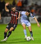25 August 2023; Michael Duffy of Derry City in action against Jordan Flores of Bohemians during the SSE Airtricity Men's Premier Division match between Bohemians and Derry City at Dalymount Park in Dublin. Photo by Stephen Marken/Sportsfile