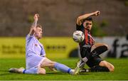 25 August 2023; Jamie McGonigle of Derry City has a shot on goal blocked by Krystian Nowak of Bohemians during the SSE Airtricity Men's Premier Division match between Bohemians and Derry City at Dalymount Park in Dublin. Photo by Stephen McCarthy/Sportsfile