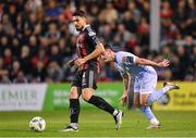 25 August 2023; Krystian Nowak of Bohemians in action against Danny Mullen of Derry City during the SSE Airtricity Men's Premier Division match between Bohemians and Derry City at Dalymount Park in Dublin. Photo by Stephen McCarthy/Sportsfile