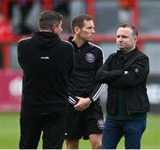 25 August 2023; Bohemians president Matt Devaney, right, with Bohemians manager Declan Devine, left, and Bohemians equipment manager Colin O'Connor, centre, before the SSE Airtricity Men's Premier Division match between Bohemians and Derry City at Dalymount Park in Dublin. Photo by Stephen McCarthy/Sportsfile