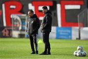 25 August 2023; Derry City manager Ruaidhrí Higgins, right, and Bohemians director of football Pat Fenlon before the SSE Airtricity Men's Premier Division match between Bohemians and Derry City at Dalymount Park in Dublin. Photo by Stephen McCarthy/Sportsfile