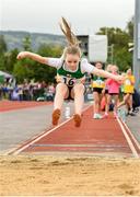 26 August 2023; Emmie Farrelly from Edenderry, Offaly competes in the under-12 Long Jump during the Community Games National Track and Field finals at Carlow SETU in Carlow. Photo by Matt Browne/Sportsfile