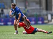 26 August 2023; Emma Jane Wilson of Leinster in action against Lily Byrne of Munster during the Girls Interprovincial Championship match between Leinster and Munster at Energia Park in Dublin. Photo by Piaras Ó Mídheach/Sportsfile