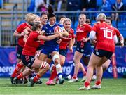 26 August 2023; Natasja Behan of Leinster in action against Claire Bennett of Munster during the Vodafone Women’s Interprovincial Championship match between Leinster and Munster at Energia Park in Dublin. Photo by Piaras Ó Mídheach/Sportsfile