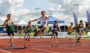 26 August 2023; Aidian McNamara from Eadestown, Kildare, jumps the last hurdle on his way to winning the Boys under-10 60m Hurdle Final during the Community Games National Track and Field finals at Carlow SETU in Carlow. Photo by Matt Browne/Sportsfile