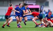 26 August 2023; Leah Tarpey of Leinster is tackled by Jane Clohessy of Munster, right, during the Vodafone Women’s Interprovincial Championship match between Leinster and Munster at Energia Park in Dublin. Photo by Piaras Ó Mídheach/Sportsfile