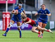 26 August 2023; Eimear Corri of Leinster in action against Alana McInerney of Munster during the Vodafone Women’s Interprovincial Championship match between Leinster and Munster at Energia Park in Dublin. Photo by Piaras Ó Mídheach/Sportsfile