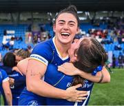 26 August 2023; Leinster players Aimee Clarke and Aoife Moore, right, celebrate after their side's victory in the Vodafone Women’s Interprovincial Championship match between Leinster and Munster at Energia Park in Dublin. Photo by Piaras Ó Mídheach/Sportsfile