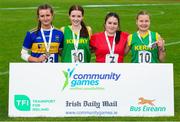26 August 2023; Under-16 Discus medel winners, from left, second place Marie Shanahan from St Flannans, Tippery, winner Niamh O'Shea, from Firies, Kerry, third place Diana Rose Coakley from Skibereen, Cork and fourth place Anna O'Shea from Spa-Mucross, Kerry, during the Community Games National Track and Field finals at Carlow SETU in Carlow. Photo by Matt Browne/Sportsfile