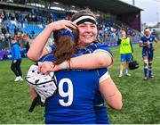 26 August 2023; Leinster players Katie Whelan, 9, and Sarah Delaney celebrate after their side's victory in the Vodafone Women’s Interprovincial Championship match between Leinster and Munster at Energia Park in Dublin. Photo by Piaras Ó Mídheach/Sportsfile