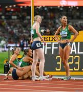 26 August 2023; The Ireland relay team, from left, Sophie Becker, Sharlene Mawdsley, Roisin Harrison and Kelly McGrory after competing in the women's 4x400m during day eight of the World Athletics Championships at the National Athletics Centre in Budapest, Hungary. Photo by Sam Barnes/Sportsfile