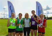 26 August 2023; Irish international hurdler Sarah Quinn and winner of the 2012 Girls under-14 80m hurdles with, from left, second place Niamh Doogan from Rosses, Donegal, first place Megan O'Shea from Crecora-Patrickswell, Limerick, third place Sarah O'Brien from Cushinstown, Wexford and fourth place Rebecca Trimble from Togher, Louth during the Community Games National Track and Field finals at Carlow SETU in Carlow. Photo by Matt Browne/Sportsfile