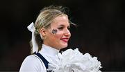 26 August 2023; A Notre Dame cheerleader during the Aer Lingus College Football Classic match between Notre Dame and Navy Midshipmen at the Aviva Stadium in Dublin. Photo by Ben McShane/Sportsfile