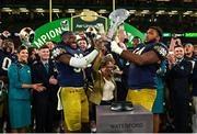 26 August 2023; Notre Dame wide receiver Jayden Thomas #83, left, and offensive lineman Blake Fisher #54, right, lift the Keough - Naughton College Football Ireland trophy after the Aer Lingus College Football Classic match between Notre Dame and Navy Midshipmen at the Aviva Stadium in Dublin. Photo by Brendan Moran/Sportsfile