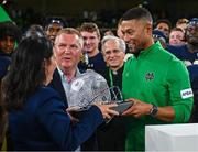 26 August 2023; Notre Dame head coach Marcus Freeman is presented with his trophy by Minister for Tourism, Culture, Arts, Gaeltacht, Sport and Media, Catherine Martin TD, left, and Minister for Finance Michael McGrath TD after the Aer Lingus College Football Classic match between Notre Dame and Navy Midshipmen at the Aviva Stadium in Dublin. Photo by Brendan Moran/Sportsfile