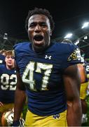26 August 2023; Notre Dame defensive lineman Jason Onye #47 celebrates after the Aer Lingus College Football Classic match between Notre Dame and Navy Midshipmen at the Aviva Stadium in Dublin. Photo by Ben McShane/Sportsfile