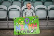 27 August 2023; Cabinteely supporter Andrew Dardis, age 2, shows his support for Niamh Haskins before the Sports Direct Women’s FAI Cup first round match between Cabinteely and Bohemians at Carlisle Grounds in Bray, Wicklow. Photo by Stephen McCarthy/Sportsfile