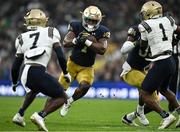 26 August 2023; Notre Dame running back Audric Estimé #7 during the Aer Lingus College Football Classic match between Notre Dame and Navy Midshipmen at the Aviva Stadium in Dublin. Photo by Brendan Moran/Sportsfile