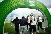 26 August 2023; Navy Midshipmen quarterback Tai Lavatai #1 and his teammates run out onto the pitch before the Aer Lingus College Football Classic match between Notre Dame and Navy Midshipmen at the Aviva Stadium in Dublin. Photo by Brendan Moran/Sportsfile