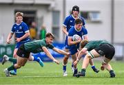 27 August 2023; Harley Fagan Harold of Leinster in action against Joseph Smyth, left, and Diarmaid O'Connell of Connacht during the U18 Clubs Interprovincial Championship match between Leinster and Connacht at Energia Park in Dublin. Photo by Piaras Ó Mídheach/Sportsfile