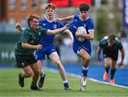 27 August 2023; Oisin O'Hara of Leinster is tackled by Finnan Strain of Connacht during the U18 Clubs Interprovincial Championship match between Leinster and Connacht at Energia Park in Dublin. Photo by Piaras Ó Mídheach/Sportsfile