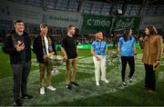 26 August 2023; MC Gráinne McElwain interviews Dublin footballer Hannah Tyrrell, in the company of teammate Abbie Shiels and Dublin's men's footballers Ciaran Kilkenny, Killian McGinnis and Adam Fearon during the Aer Lingus College Football Classic match between Notre Dame and Navy Midshipmen at the Aviva Stadium in Dublin. Photo by Brendan Moran/Sportsfile