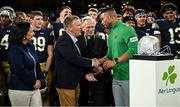 26 August 2023; Minister for Finance Michael McGrath TD congratulates Notre Dame head coach Marcus Freeman during the Aer Lingus College Football Classic match between Notre Dame and Navy Midshipmen at the Aviva Stadium in Dublin. Photo by Brendan Moran/Sportsfile
