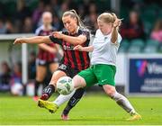 27 August 2023; Fiona Donnelly of Bohemians shoots to score her side's first goal despite the attention of Catriona McGilp of Cabinteely during the Sports Direct Women’s FAI Cup first round match between Cabinteely and Bohemians at Carlisle Grounds in Bray, Wicklow. Photo by Stephen McCarthy/Sportsfile