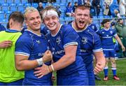 27 August 2023; Leinster players, from left, Tom Stewart, James Wyse and Adam Watchorn celebrate after their side's victory in the U19 Men's Interprovincial Championship match between Leinster and Connacht at Energia Park in Dublin. Photo by Piaras Ó Mídheach/Sportsfile