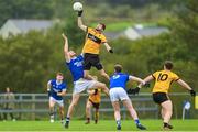27 August 2023; Dara Mulgrew of St Eunan's in action against Leo McLoone of Naomh Conaill during the Donegal County Senior Club Football Championship match between Naomh Conaill and St Eunan's at Davy Brennan Memorial Park in Gortnamucklagh, Donegal. Photo by Ramsey Cardy/Sportsfile