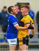 27 August 2023; Conor O'Donnell of St Eunan's and AJ Gallagher of Naomh Conaill tussle during the Donegal County Senior Club Football Championship match between Naomh Conaill and St Eunan's at Davy Brennan Memorial Park in Gortnamucklagh, Donegal. Photo by Ramsey Cardy/Sportsfile