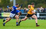 27 August 2023; Eoin Dowling of St Eunan's in action against Brendan McDyre of Naomh Conaill during the Donegal County Senior Club Football Championship match between Naomh Conaill and St Eunan's at Davy Brennan Memorial Park in Gortnamucklagh, Donegal. Photo by Ramsey Cardy/Sportsfile